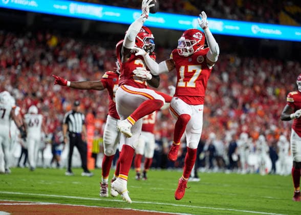 Kansas City Chiefs safety Alohi Gilman (17) and Kansas City Chiefs linebacker Nick Bolton (32) celebrate a big defensive play against the Broncos on Monday Night Football at Arrowhead Stadium in Kansas City, Missouri on Monday September 14, 2026.  KCP2026091424 JONxROBICHAUD