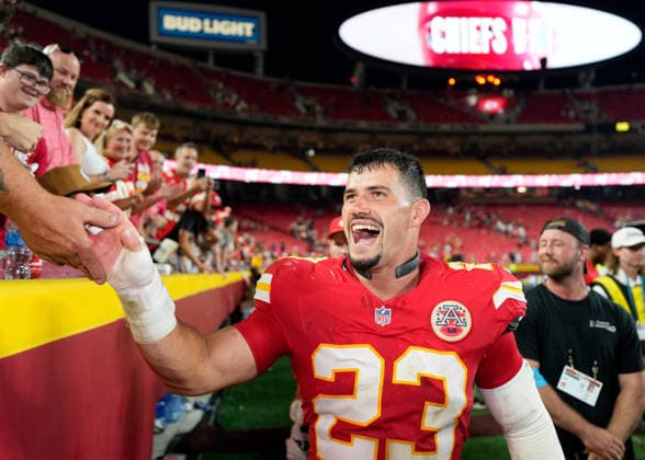 Kansas City Chiefs linebacker Drue Tranquill (23) celebrates with fans after a big win over the Broncos on Monday Night Football at Arrowhead Stadium in Kansas City, Missouri on Monday September 14, 2026.  KCP2026091425 JONxROBICHAUD