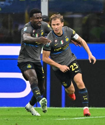 (260915) -- MILAN, Sept. 15, 2026 -- Inter Milan s Nicolo Barella (R) celebrates his goal with teammate Marcus Thuram during a Serie A soccer match between Inter Milan and Udinese in Milan, Italy, Sept.14, 2026. (Photo by Xinhua) (SP)ITALY-MILAN-FOOTBALL-SERIE A-INTER MILAN VS UDINESE AlbertoxLingria 