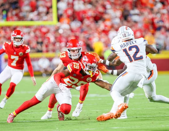 Sep 14, 2026: Kansas City Chiefs safety Xavier Nwankpa (29) tackles Denver Broncos running back RJ Harvey (12) in Kansas City, MO, USA; at Arrowhead Stadium. Mandatory Credit: -Cal Media Kansas City USA - ZUMAc04_ 20260914_zma_c04_056 Copyright: xRomanxPunox