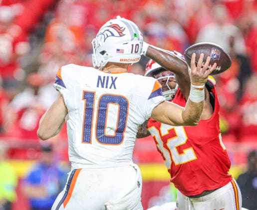Sep 14, 2026: Kansas City Chiefs linebacker Nick Bolton (32) deflects the pass from Denver Broncos quarterback Bo Nix (10) in the 4th quarter against the Denver Broncos in Kansas City, MO, USA; at Arrowhead Stadium. Mandatory Credit: -Cal Media Kansas City USA - ZUMAc04_ 20260914_zma_c04_069 Copyright: xRomanxPunox