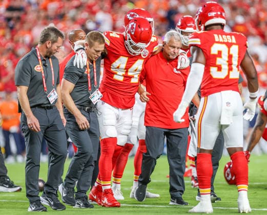 Sep 14, 2026: Kansas City Chiefs linebacker Cooper McDonald (44) gets help off the field after an apparent injury against the Denver Broncos Kansas City, MO, USA; at Arrowhead Stadium. Mandatory Credit: -Cal Media Kansas City USA - ZUMAc04_ 20260914_zma_c04_078 Copyright: xRomanxPunox