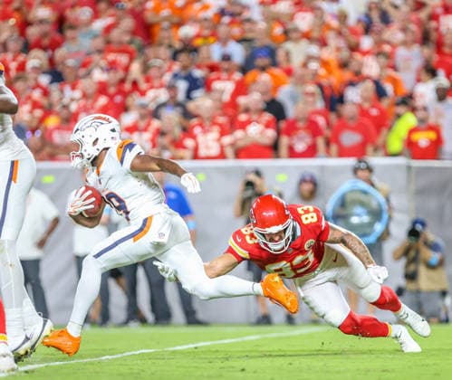 Sep 14, 2026: Kansas City Chiefs tight end Noah Gray (83) tackles Denver Broncos wide receiver Marvin Mims Jr. (19) during kick off in Kansas City, MO, USA; at Arrowhead Stadium. Mandatory Credit: -Cal Media Kansas City USA - ZUMAc04_ 20260914_zma_c04_095 Copyright: xRomanxPunox