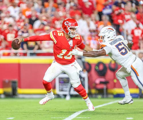 Sep 14, 2026: Kansas City Chiefs quarterback Patrick MahomesÃ‚ (15) tries to get away from Denver Broncos outside linebacker Que Robinson (51) in Kansas City, MO, USA; at Arrowhead Stadium. Mandatory Credit: -Cal Media Kansas City USA - ZUMAc04_ 20260914_zma_c04_108 Copyright: xRomanxPunox