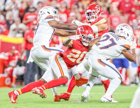 Sep 14, 2026: Kansas City Chiefs defensive back Nohl Williams (20) tackles Denver Broncos running back J.K. Dobbins (27) in Kansas City, MO, USA; at Arrowhead Stadium. Mandatory Credit: -Cal Media Kansas City USA - ZUMAc04_ 20260914_zma_c04_118 Copyright: xRomanxPunox