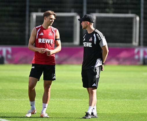 September 15, 2026, xophax, Soccer, Bundesliga 1, 1. FC Köln Training: Joel Schmied (1. FC Köln), left, and Coach Rene Wagner (1. FC Köln). DFL and DFB regulations prohibit any use of photographs as image sequences and or quasi-video. Cologne