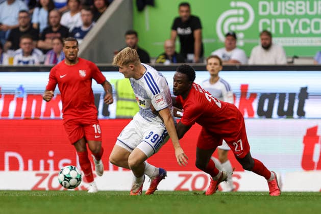 Peter Remmert of MSV Duisburg and Donald Nduka of TSV Havelse battle for the ball during the 3. Liga match between MSV Duisburg and TSV Havelse at the Schauinsland Reisen Arena on September 15, 2026, in Duisburg, Germany. Photo by Oliver Kaelke, DeFodi Images. Peter Remmert of MSV Duisburg and Donald Nduka of TSV Havelse battle for the ball during the 3. Liga match between MSV Duisburg and TSV Havelse at Schauinsland Reisen Arena on September 15, 2026 in Duisburg, Germany. Photo by Oliver Kaelke, DeFodi Images. DFB and DFL regulations prohibit any use of photographs as image sequences and or quasi-video. Photo by Oliver Kaelke, DeFodi Images.