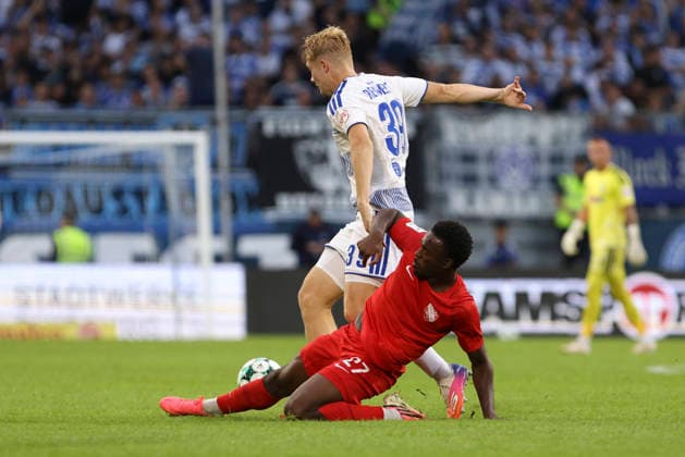 Peter Remmert of MSV Duisburg and Donald Nduka of TSV Havelse battle for the ball during the 3. Liga match between MSV Duisburg and TSV Havelse at the Schauinsland Reisen Arena on September 15, 2026, in Duisburg, Germany. Photo by Oliver Kaelke, DeFodi Images. Peter Remmert of MSV Duisburg and Donald Nduka of TSV Havelse battle for the ball during the 3. Liga match between MSV Duisburg and TSV Havelse at Schauinsland Reisen Arena on September 15, 2026 in Duisburg, Germany. Photo by Oliver Kaelke, DeFodi Images. DFB and DFL regulations prohibit any use of photographs as image sequences and or quasi-video. Photo by Oliver Kaelke, DeFodi Images.
