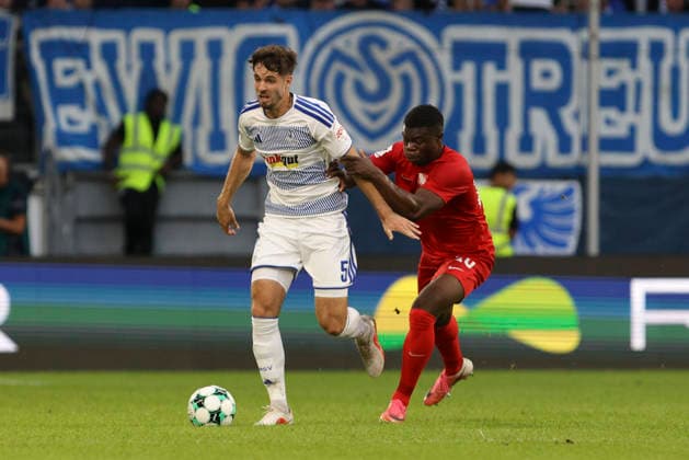 Tobias Fleckstein of MSV Duisburg and Alexander Guiddir of TSV Havelse battle for the ball during the 3. Liga match between MSV Duisburg and TSV Havelse at the Schauinsland Reisen Arena on September 15, 2026, in Duisburg, Germany. Photo by Oliver Kaelke, DeFodi Images. Tobias Fleckstein of MSV Duisburg and Alexander Guiddir of TSV Havelse battle for the ball during the 3. Liga match between MSV Duisburg and TSV Havelse at Schauinsland Reisen Arena on September 15, 2026 in Duisburg, Germany. Photo by Oliver Kaelke, DeFodi Images. DFB and DFL regulations prohibit any use of photographs as image sequences and or quasi-video. Photo by Oliver Kaelke, DeFodi Images.