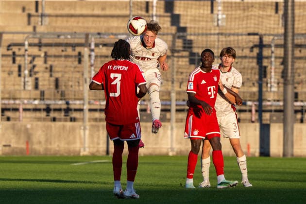 Felix Guha 13, FC Augsburg II; Richard Ajavi 3, FC Bayern Munich Amateurs; Assomo Bastian Friedrich 9, FC Bayern Munich Amateurs; David Lichtensteiger 3 FC Augsburg II, FC Bayern II vs. FC Augsburg II, Soccer, Bavarian Regional League, Matchday 9, September 15, 2026. DFB regulations prohibit any use of photographs as image sequences and or quasi-video. Munich, Bavaria, Germany Copyright: xkolbert-press UlrichxGamelx