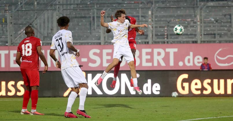 September 15, 2026, xfsx, Men s, Soccer, 2026–2027 Season, 3rd Division, Matchday 6: FC Würzburger Kickers vs. Alemannia Aachen; Franck Evina (FC Würzburger Kickers), Joel da Silva Kiala, Alemannia Aachen; Kacper Koscierski, Alemannia Aachen; Tarsis Bonga, FC Würzburger Kickers scores the goal to make it 1–0, scores the goal 1–0, Würzburger Kickers, AKON ARENA, Bavaria, Germany