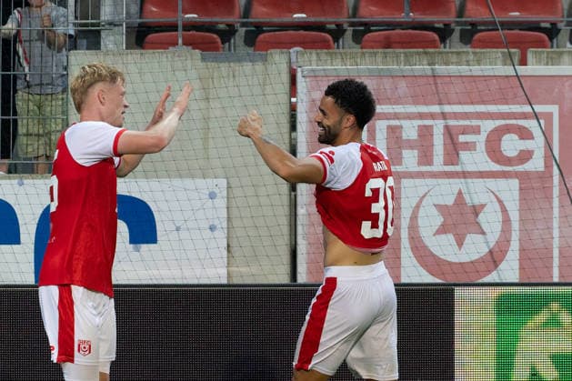 Lennard Becker (HFC), 25, celebrates with Stanley Ratifo (HFC), 30, after his goal to make it 1–0, Hallescher FC vs. FC Carl Zeiss Jena, soccer, Northeast Regional League, Matchday 9, 2026–27 season, September 15, 2026, Halle Leuna Chemie Stadium, ST Deutschland