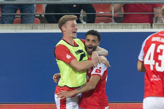 Lucas Ehrlich (HFC), 18, celebrates with Stanley Ratifo (HFC), 30, after his goal to make it 2–0, Hallescher FC vs. FC Carl Zeiss Jena, soccer, Northeast Regional League, Matchday 9, 2026–27 season, September 15, 2026, Halle Leuna Chemie Stadium, ST Deutschland
