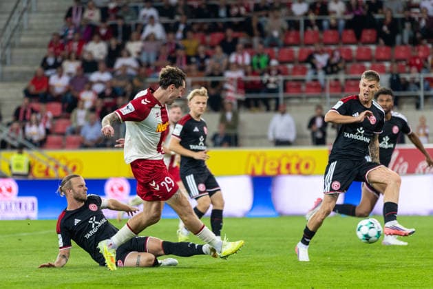 September 15, 2026, Soccer, GER, Season, 3rd Division, 2026–2027 Season, Matchday 6, SSV Jahn Regensburg vs. Fortuna Düsseldorf, Adrian Fein, Regensburg falls to Erik Wekesser, Düsseldorf. DFL regulations prohibit any use of photographs as image sequences and or quasi-video.