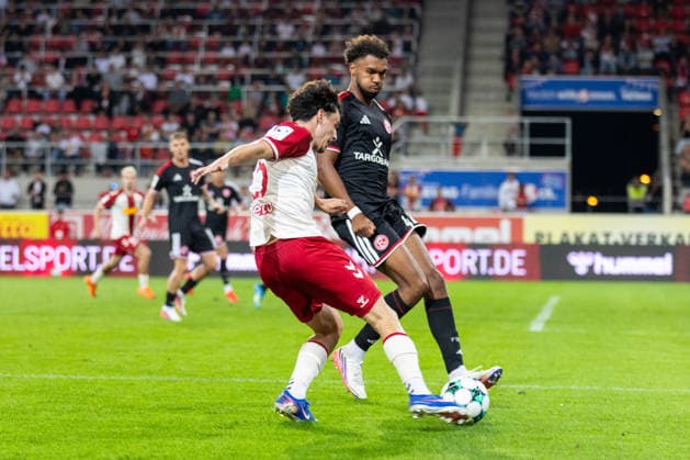 September 15, 2026, Soccer, GER, Season, 3rd Division, 2026–2027 Season, Matchday 6, SSV Jahn Regensburg vs. Fortuna Düsseldorf, Nicolas Oliveira (SSV Jahn Regensburg) vs. Elias Aboulguie Egouli (Düsseldorf). DFL regulations prohibit any use of photographs as image sequences and or quasi-video.