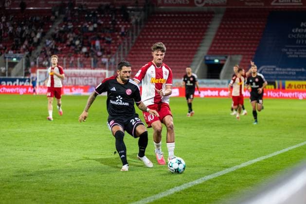 September 15, 2026, Soccer, GER, Season, 3rd Division, 2026–2027 Season, Matchday 6, SSV Jahn Regensburg vs. Fortuna Düsseldorf, Matthias Zimmermann (Düsseldorf) vs. Jakob Seibold (SSV Jahn Regensburg). DFL regulations prohibit any use of photographs as image sequences and or quasi-video.