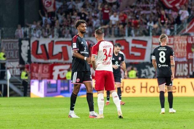 September 15, 2026, Soccer, GER, Season, 3rd Division, 2026–2027 Season, Matchday 6, SSV Jahn Regensburg vs. Fortuna Düsseldorf, Elias Aboulguie Egouli (Düsseldorf) and Patrick Hobsch (SSV Jahn Regensburg). DFL regulations prohibit any use of photographs as image sequences and or quasi-video.