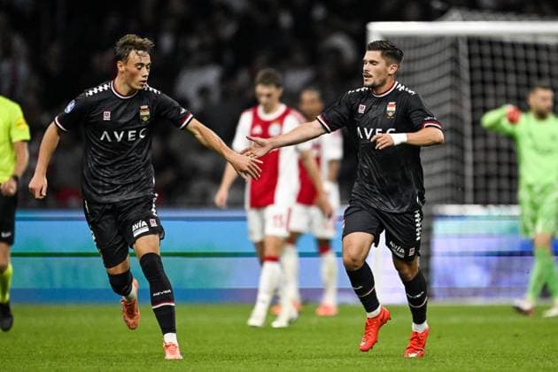 AMSTERDAM - (lr) Uriel van Aalst of Willem II and Alessandro Ciranni of Willem II celebrate the 4-1 during the Dutch Eredivisie match between Ajax and Willem II at the Johan Cruijff ArenA on September 15, 2026 in Amsterdam, the Netherlands. OLAF KRAAK ANP Eredivisie 2026 27 xVIxANPxSportx xxANPxIVx 568740417 originalFilename: 568740417.jpg