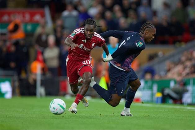 RECORD DATE NOT STATED Football - Football League Cup - 3rd Round - Liverpool FC v Fulham FC LIVERPOOL, ENGLAND - Tuesday, September 15, 2026: Liverpool s Jeremie Frimpong goes past a diving Tottenham Hotspur s Mathys Tel (R) during the Football League Cup 3rd Round match between Liverpool FC and Tottenham Hotspur FC at Anfield. (Photo by David Rawcliffe Propaganda) LIVERPOOL Anfield MERSEYSIDE ENGLAND  Copyright: xDavidxRawcliffex 2026-09-15-Liverpool_v_Tottenham-059