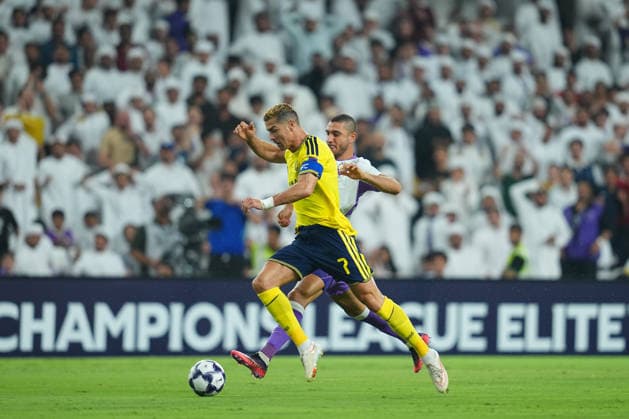 AL AIN, UNITED ARAB EMIRATES - SEPTEMBER 15: Cristiano Ronaldo of Al-Nassr FC and Ramy Rabia of Al-Ain FC during the AFC Champions League Elite group stage match between Al Ain FC and Al Nassr at the Hazza bin Zayed Stadium on September 15, 2026 in Al Ain, United Arab Emirates. Al Ain vs. Al- Nassr - 2026 27 AFC Champions League Elite match 1 of 8 - West Region group at Hazza bin Zayed Stadium, Al Ain, UAE. 15 SEPTEMBER 2026 Copyright: xx