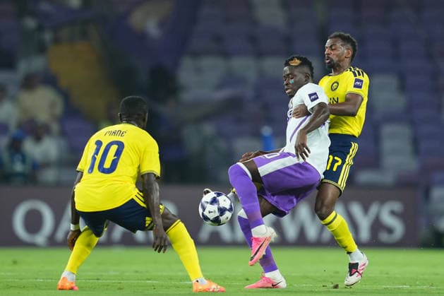 AL AIN, UNITED ARAB EMIRATES - SEPTEMBER 15: Abdoul Karim Traore of Al-Ain FC and Sadio Mane and Abdullah Al-Khaibari of Al-Nassr FC in action during the AFC Champions League Elite group stage match between Al Ain FC and Al Nassr at the Hazza bin Zayed Stadium on September 15, 2026 in Al Ain, United Arab Emirates. Al Ain vs. Al- Nassr - 2026 27 AFC Champions League Elite match 1 of 8 - West Region group at Hazza bin Zayed Stadium, Al Ain, UAE. 15 SEPTEMBER 2026 Copyright: xx
