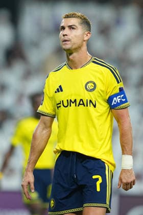 AL AIN, UNITED ARAB EMIRATES - SEPTEMBER 15: A portrait of Cristiano Ronaldo of Al Nassr during the AFC Champions League Elite group stage match between Al Ain FC and Al Nassr at the Hazza bin Zayed Stadium on September 15, 2026 in Al Ain, United Arab Emirates. The Portuguese forward is pictured in the yellow Al Nassr home kit featuring the HUMAIN sponsor logo and the captain s armband bearing the AFC logo. . Al Ain vs. Al- Nassr - 2026 27 AFC Champions League Elite match 1 of 8 - West Region group at Hazza bin Zayed Stadium, Al Ain, UAE. 15 SEPTEMBER 2026 Copyright: xx