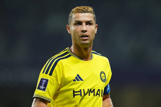 AL AIN, UNITED ARAB EMIRATES - SEPTEMBER 15: A portrait of Cristiano Ronaldo of Al Nassr during the AFC Champions League Elite group stage match between Al Ain FC and Al Nassr at the Hazza bin Zayed Stadium on September 15, 2026 in Al Ain, United Arab Emirates. The Portuguese forward is pictured in the yellow Al Nassr home kit featuring the HUMAIN sponsor logo and the captain s armband bearing the AFC logo. . Al Ain vs. Al- Nassr - 2026 27 AFC Champions League Elite match 1 of 8 - West Region group at Hazza bin Zayed Stadium, Al Ain, UAE. 15 SEPTEMBER 2026 Copyright: xx