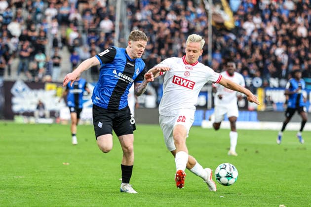 Joey Mueller (SV Waldhof Mannheim), 6, and Janne Sietan (Rot-Weiss Essen), 22; SV Waldhof Mannheim vs. Rot-Weiss Essen on September 16, 2026, in Mannheim at Carl Benz Stadium. Photo by Alfio Marino Copyright: