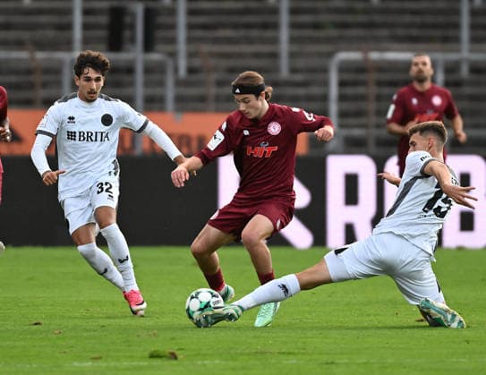 September 16, 2026, xophax, Soccer 3rd Division, Fortuna Cologne vs. SV Wehen Wiesbaden: Raul Carlos Caldaroska (Wehen), Bennit Kröger (Fortuna Cologne), Justin Janitzek (Wehen) vs. Cologne