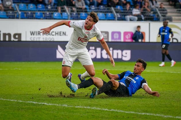 Germany Soccer 3rd Division 2026–2027, Matchday 6: SV Waldhof Mannheim vs. Rot-Weiss Essen at Carl Benz Stadium in Mannheim; Semir Telalovic (Rot-Weiss Essen) and Claudio Kammerknecht in a tackle Copyright: xJOERANxSTEINSIEKx