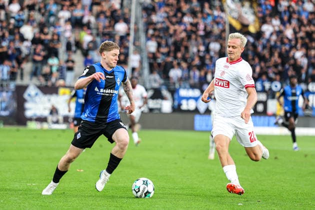 Joey Mueller (SV Waldhof Mannheim), 6, and Janne Sietan (Rot-Weiss Essen), 22; SV Waldhof Mannheim vs. Rot-Weiss Essen on September 16, 2026, in Mannheim at Carl Benz Stadium. Photo by Alfio Marino Copyright: