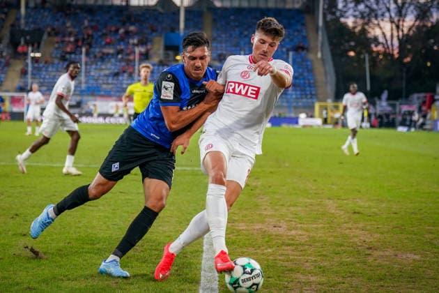 German Soccer 3rd Division 2026–2027, Matchday 6: SV Waldhof Mannheim vs. Rot-Weiß Essen at Carl Benz Stadium in Mannheim; Claudio Kammerknecht (Waldhof Mannheim, No. 15) and Semir Telalovic (Rot-Weiß Essen, No. 17) in a tackle Copyright: xJOERANxSTEINSIEKx