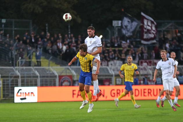 Soccer, Northeast Regional League: 1 FC Lok Leipzig vs. BFC Dynamo, September 16, 2026; Simon Schierack (6), Lok Leipzig, vs. Viktor Miftaraj (5), BFC Dynamo, in a header duel; Soccer, Northeast Regional League, 2026–2027 season, Matchday 9: 1 FC Lok Leipzig vs. BFC Dynamo on September 16, 2026, at Bruno Plache Stadium, Leipzig Copyright: xBEAUTIFULxSPORTS JanxKaeferx