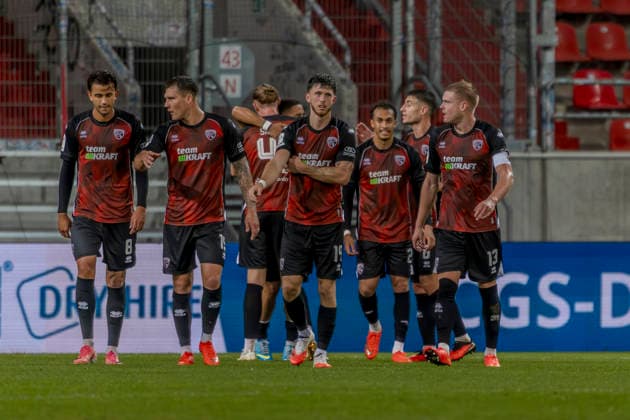 Ingolstadt, Germany, August 8, 2026, 3rd League 2026–2027, Matchday 6: FC Ingolstadt 04 vs. TSG Hoffenheim II. Pictured in the crowd: FCI goal scorer Nishan Velupillay celebrates with his teammates after scoring the 1–0 goal, DFB and DFL regulations prohibit any use of photographs as image sequences and or quasi-video. Audi Sportpark Bayern Copyright: xFotostandx xSchäferx