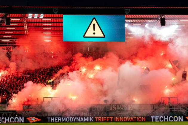 SC Preussen Münster fans set off pyrotechnics in the home section; a screen displays a warning symbol GER, SC Preussen Münster vs. 1. FC Saarbrücken, soccer, 3. Liga, Matchday 6, 2026–2027 season, September 16, 2026 DFL regulations prohibit the use of photographs as image sequences and or quasi-video (GER), SC Preussen Münster vs. 1. FC Saarbrücken, soccer, 3. Liga, Matchday 6, 2026–2027 season, September 16, 2026, Münster Copyright: xEibner-Pressefoto JanxRollingerx EP_JSK