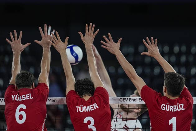 Turkiye v Latvia - CEV EuroVolley 2026 Men CLUJ-NAPOCA, ROMANIA - SEPTEMBER 16: Gokcen Yuksel (6), Ahmet Tumer and Kaan Gurbuz of Turkiye attempt to block the ball during the CEV 2026 European Men s Volleyball Championship Group D match between Turkiye and Latvia at BT Arena in Cluj-Napoca, Romania, on September 16, 2026. Osmancan Gurdogan Anadolu Cluj Romania. Editorial use only. Please get in touch for any other usage.  Copyright: x2026xAnadoluxOsmancanxGurdoganx