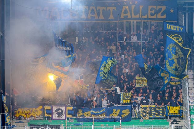 September 16, 2026, xkwix, Soccer, 3rd Division, Preußen Münster vs. 1. FC Saarbrücken, Preußenstadion, Matchday 6, 2026–2027 Season. The visitors section filled with Saarbrücken fans, flags, and pyrotechnics. DFB regulations prohibit the use of photographs as image sequences and or quasi-video. Photo: xKamilxWilkowskixPressefotoKochx, North Rhine-Westphalia, Germany