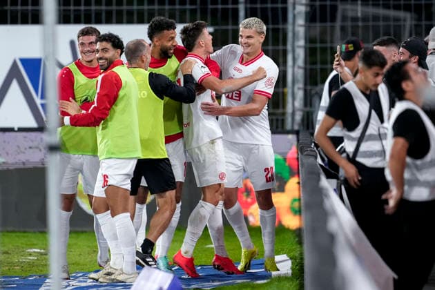 Rot Weiss Essen players celebrate the goal that made the score 1–2, Celebration, goal celebration, goal scored, celebrating the goal, goal, celebration, celebrating the goal, joy, happiness, happy, optimistic, positive, game scene, highlight, action, September 16, 2026, Mannheim, Germany, soccer, 3rd Division, SV Waldhof Mannheim vs. Rot Weiss Essen, DFB and DFL regulations prohibit any use of photographs as image sequences and or quasi-video xozx