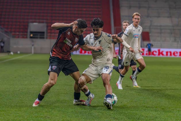 Ingolstadt, Germany, August 8, 2026, 3rd League 2026–2027, Matchday 6: FC Ingolstadt 04 vs. TSG Hoffenheim II. Pictured from left, in a tackle: Emre Gül Guel (FCI) and Yasin Zor (TSG II). DFB and DFL regulations prohibit any use of photographs as image sequences and or quasi-video. Audi Sportpark Bayern Copyright: xFotostandx xSchäferx