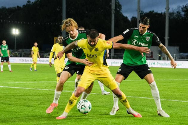 Germany 3rd Division 2026–2027, Matchday 6: SC Preußen Münster vs. 1 FC Saarbrücken, Wednesday, September 16, 2026, LVM Preußenstadion, Münster, North Rhine-Westphalia, Germany: Kai Brünker (1 FC Saarbrücken), 9; Antonio Tikvic (SC Preußen Münster), 4; Niklas Varelmann (SC Preußen Münster), 36, in a tackle Copyright: xMerlexKölkingx