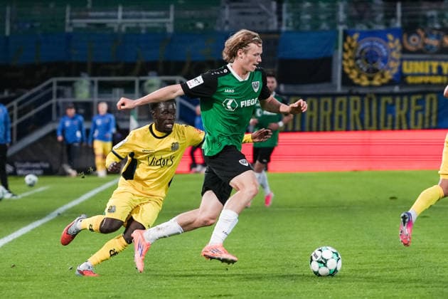 Germany 3rd Division 2026–2027, Matchday 6: SC Preußen Münster vs. 1 FC Saarbrücken, Wednesday, September 16, 2026, LVM Preußenstadion, Münster, North Rhine-Westphalia, Germany: Niklas Varelmann (SC Preußen Münster, No. 36) in a tackle against Kelsey Owusu (1 FC Saarbrücken, No. 31) Copyright: xMerlexKölkingx