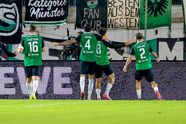 September 16, 2026, xkwix, Soccer, 3rd Division, Preußen Münster vs. 1. FC Saarbrücken, Preußenstadion, Matchday 6, 2026–2027 season: Montell Ndikom of Preußen Münster (No. 28) celebrates after scoring the 3–3 goal with the team; players include Torge Paetow (Preußen Münster, No. 16), Antonio Tikvic (Preußen Münster, No. 4), and Louis Kolbe (Preußen Münster, No. 2). DFB regulations prohibit any use of photographs as image sequences and or quasi-video. Photo: xKamilxWilkowskixPressefotoKochx, North Rhine-Westphalia, Germany