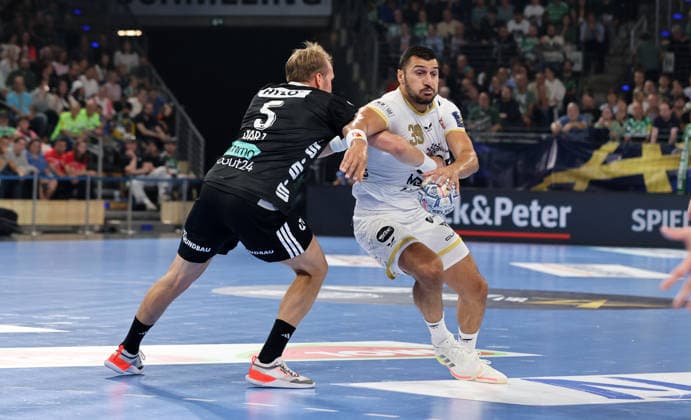 Max Darj, Yehia Mohammed Elderaa with the ball, tackle, game scene, action, sports, handball, Champions League, Men s Champions League, Matchday 2, 2026–2027 season, September 16, 2026, Füchse Berlin vs. One Veszprém HC at the Max Schmeling Halle