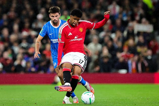 Carabao Cup round 3 Manchester United, ManU v Brighton & Hove Albion Andrey Santos of Manchester United passes the ball under pressure from Matt O Riley of Brighton & Hove Albion during the Carabao Cup round 3 match Manchester United vs Brighton & Hove Albion at Old Trafford, Manchester, United Kingdom on 16 September 2026 (Photo by Mark Cosgrove News Images) Manchester Old Trafford Greater Manchester United Kingdom Copyright: xMarkxCosgrove NewsxImagesx