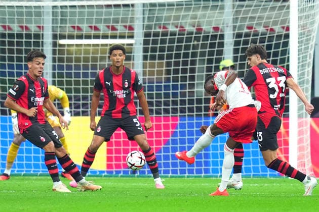 Benfica s Dode Lukebakio scores goal 0-1 during the Europa League soccer match between Ac Milan and Benfica at San Siro Stadium in Milan , Italy - September 16 , 2026. - Soccer  Copyright: xSpada LaPressex