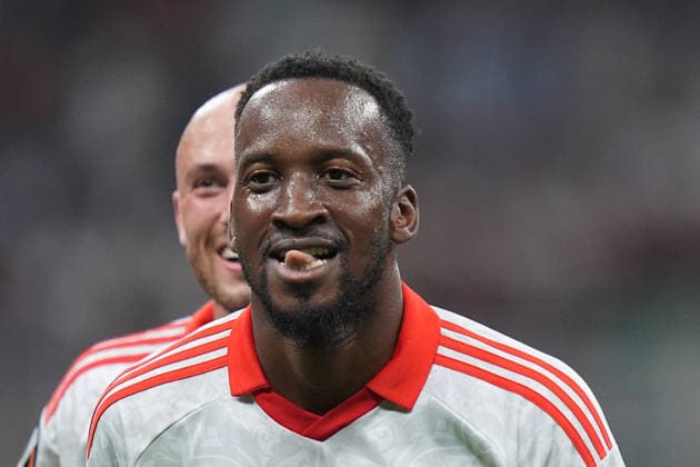 Benfica s Dode Lukebakio celebrates after scoring 0-1 during the Europa League soccer match between Ac Milan and Benfica at San Siro Stadium in Milan , Italy - September 16 , 2026. - Soccer  Copyright: xSpada LaPressex