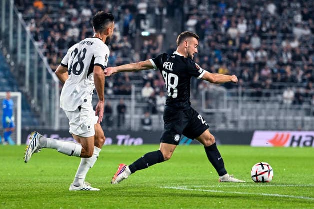 SOCCER - UEFA EL, Sturm vs Rennais GRAZ,AUSTRIA,16.SEP.26 - SOCCER - UEFA Europa League, Sturm Graz vs Stade Rennais FC. Image shows Adrien Thomasson (Rennes) and Juergen Heil (Sturm).  GEPAxpictures xAvnixRetkoceri