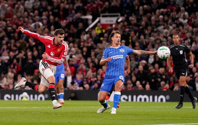 Manchester, England, 16th September 2026. Mason Mount of Manchester United, ManU (L) scores the second goal during the Manchester United vs Brighton and Hove Albion Carabao Cup match at Old Trafford, Manchester. Picture credit should read: Andrew Yates Sportimage EDITORIAL USE ONLY. No use with unauthorised audio, video, data, fixture lists, club league logos or live services. Online in-match use limited to 120 images, no video emulation. No use in betting, games or single club league player publications. SPI_003_AY_MAN_UTD_BRIGHTON SPI-5001-0003