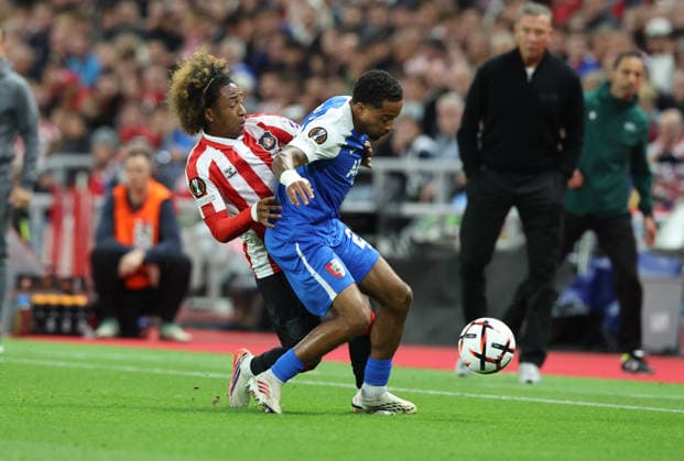 Sunderland, England, 16th September 2026. Malick Fofana (L) of Sunderland in action with Elijah Dijkstra of AZ Alkmaar during the Sunderland vs AZ Alkmaar UEFA Europa League match at the Stadium Of Light, Sunderland. Picture credit should read: Nigel Roddis Sportimage EDITORIAL USE ONLY. No use with unauthorised audio, video, data, fixture lists, club league logos or live services. Online in-match use limited to 120 images, no video emulation. No use in betting, games or single club league player publications. SPI_017_NR_SUND_AZAL SPI-5002-0017