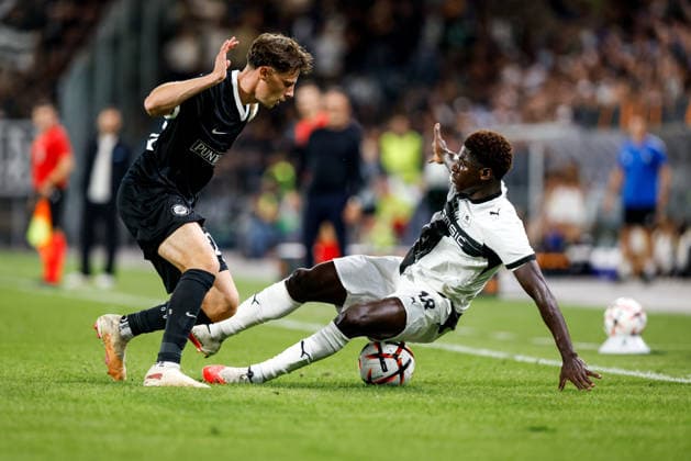 SOCCER - UEFA EL, Sturm vs Rennais GRAZ,AUSTRIA,16.SEP.26 - SOCCER - UEFA Europa League, Sturm Graz vs Stade Rennais FC. Image shows Belmin Beganovic (Sturm) and Mohamadou Aboubakar Nagida (Rennais).  GEPAxpictures xJamesxDoak